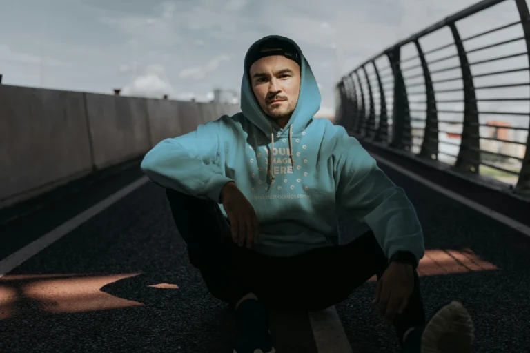Man Wearing Sky Blue Hoodie Mockup Front View Template