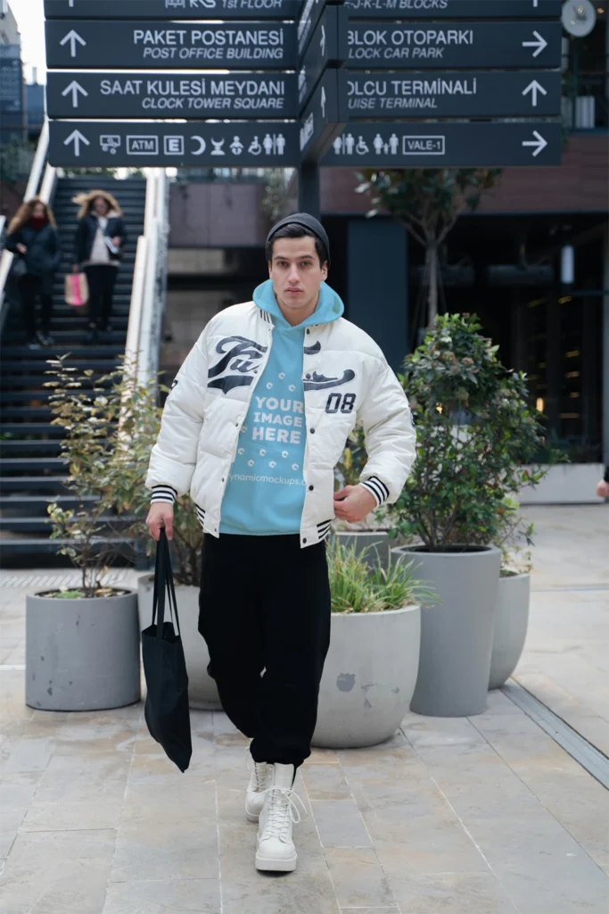 Man Wearing Sky Blue Hoodie Mockup Front View Template