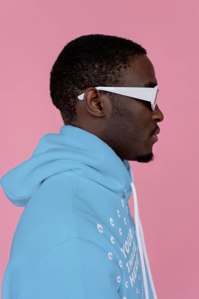 Man Wearing Sky Blue Hoodie Mockup Side View Template