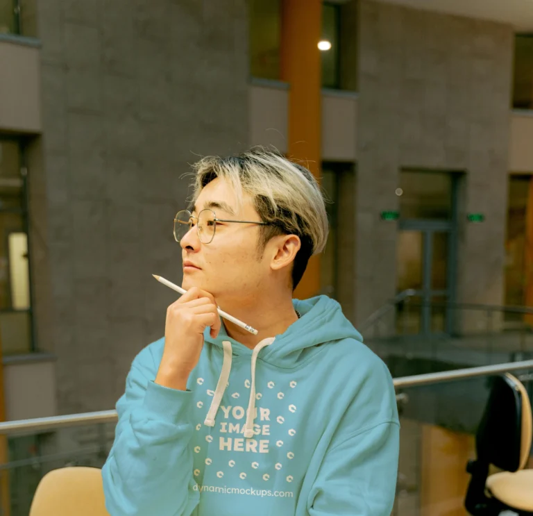 Man Wearing Sky Blue Hoodie Mockup Front View Template
