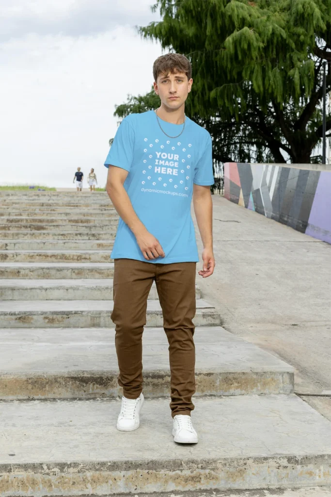 Man Wearing Sky Blue T-shirt Mockup Front View Template