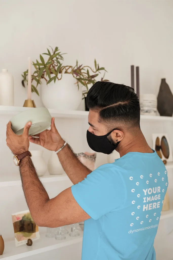 Man Wearing Sky Blue T-shirt Mockup Back View Template