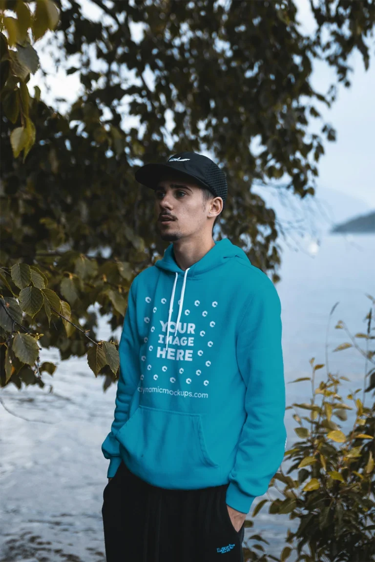 Man Wearing Teal Hoodie Mockup Front View Template