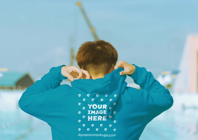 Man Wearing Teal Hoodie Mockup Back View Template