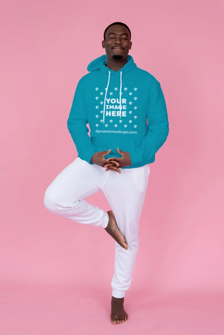 Man Wearing Teal Hoodie Mockup Front View Template