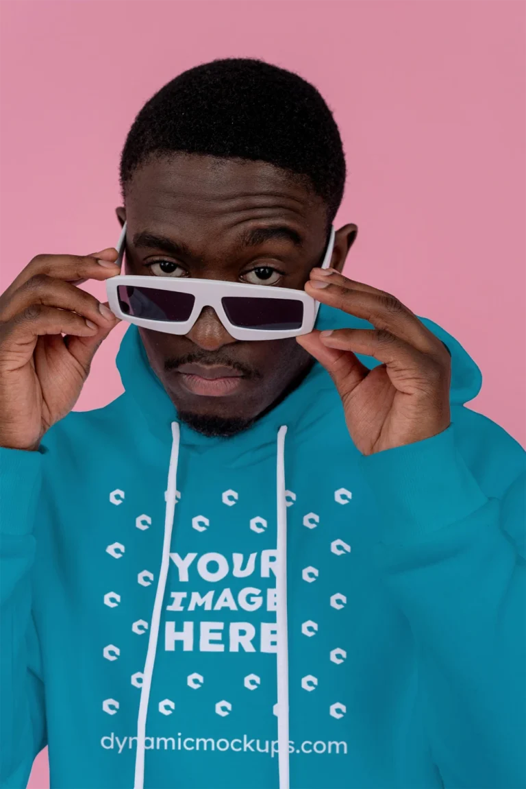 Man Wearing Teal Hoodie Mockup Front View Template