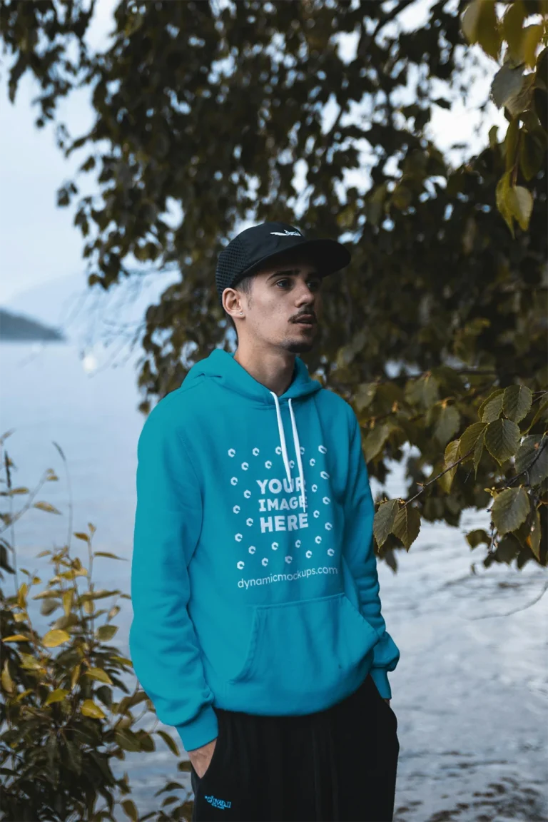 Man Wearing Teal Hoodie Mockup Front View Template