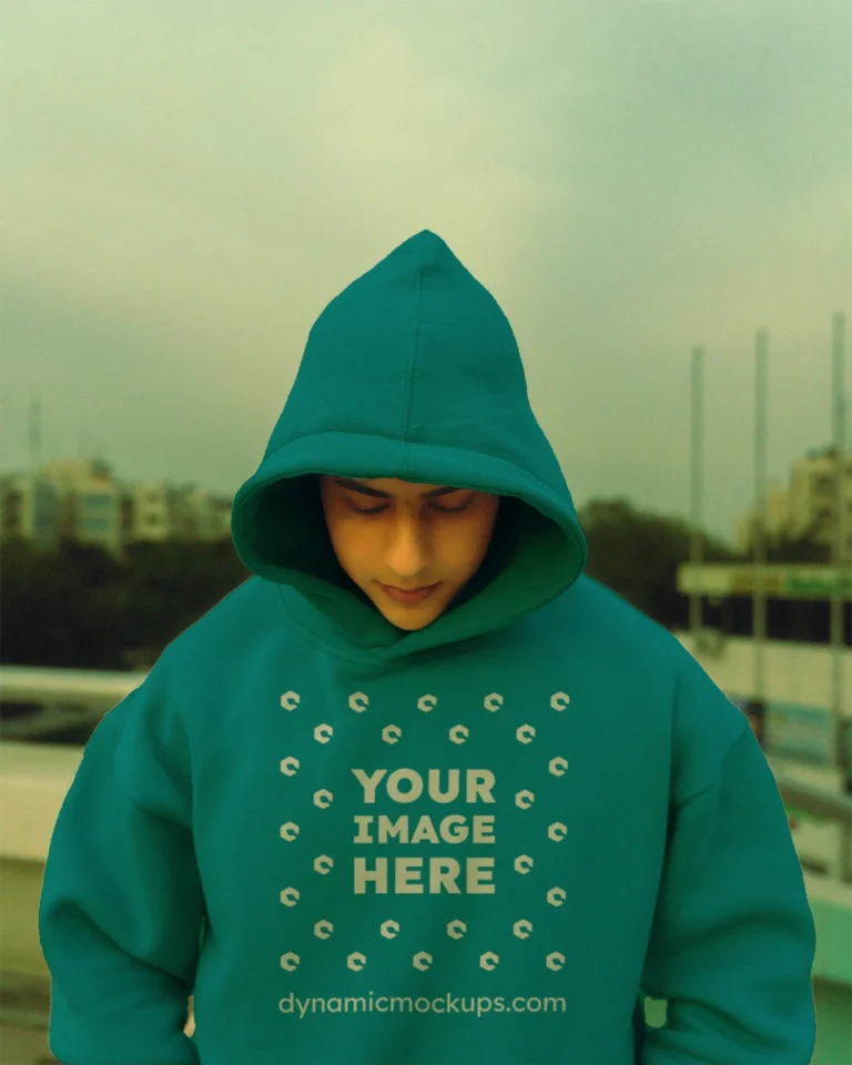 Man Wearing Teal Hoodie Mockup Front View Template