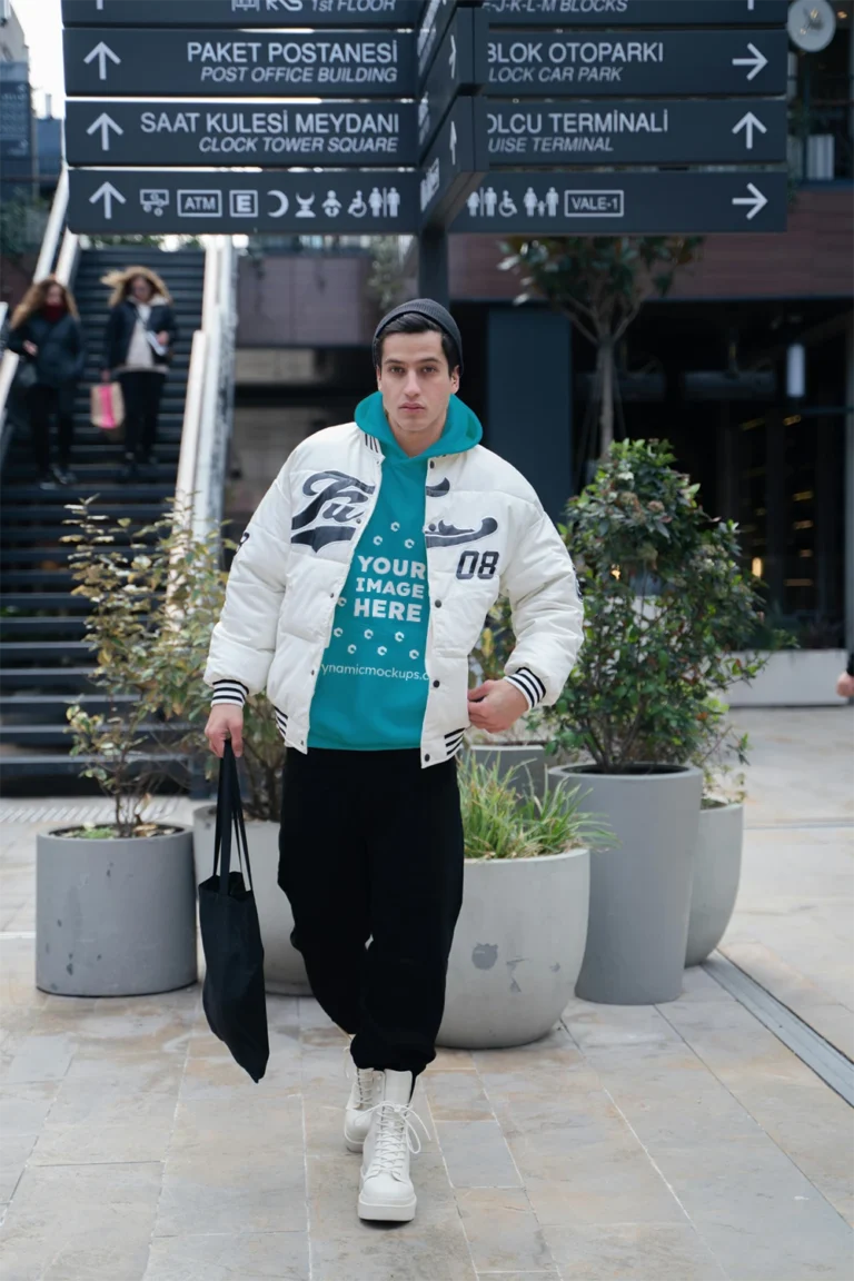 Man Wearing Teal Hoodie Mockup Front View Template