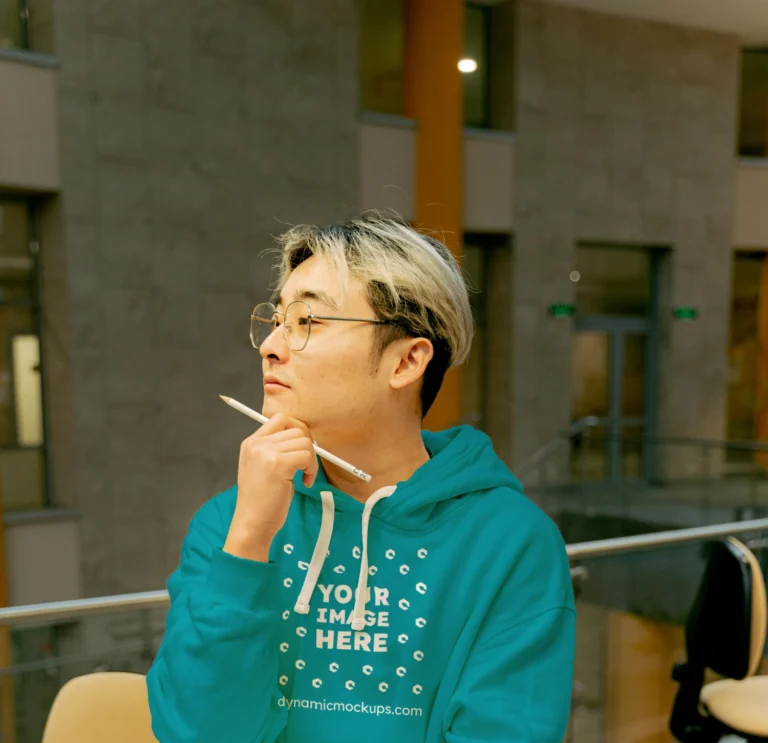 Man Wearing Teal Hoodie Mockup Front View Template