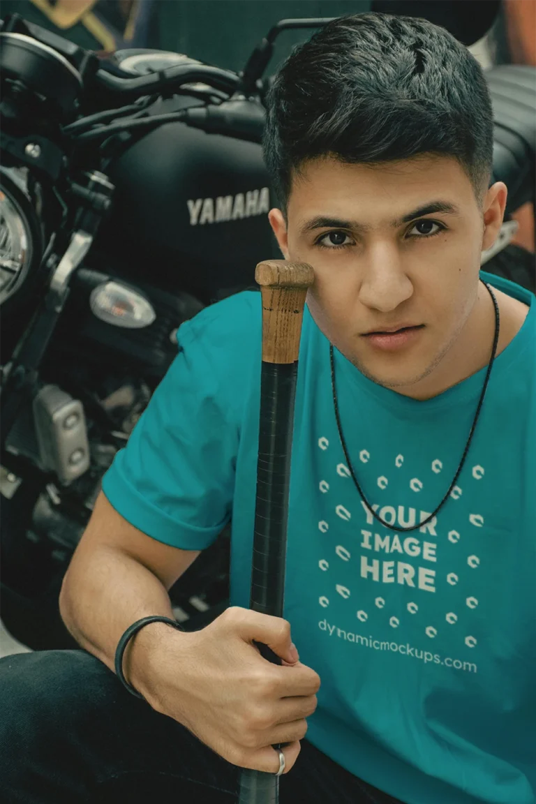 Man Wearing Teal T-shirt Mockup Front View Template