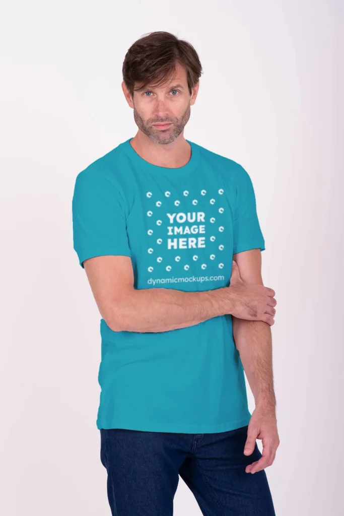 Man Wearing Teal T-shirt Mockup Front View Template