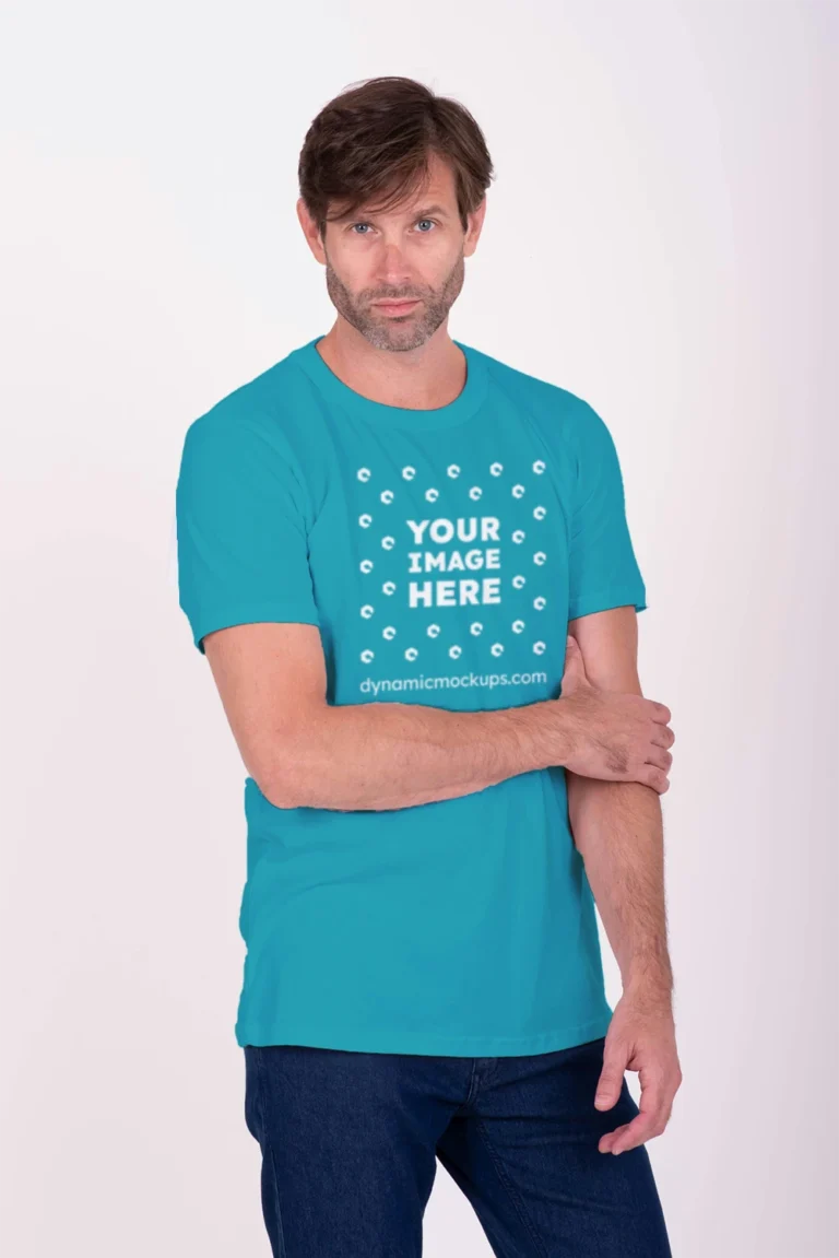 Man Wearing Teal T-shirt Mockup Front View Template