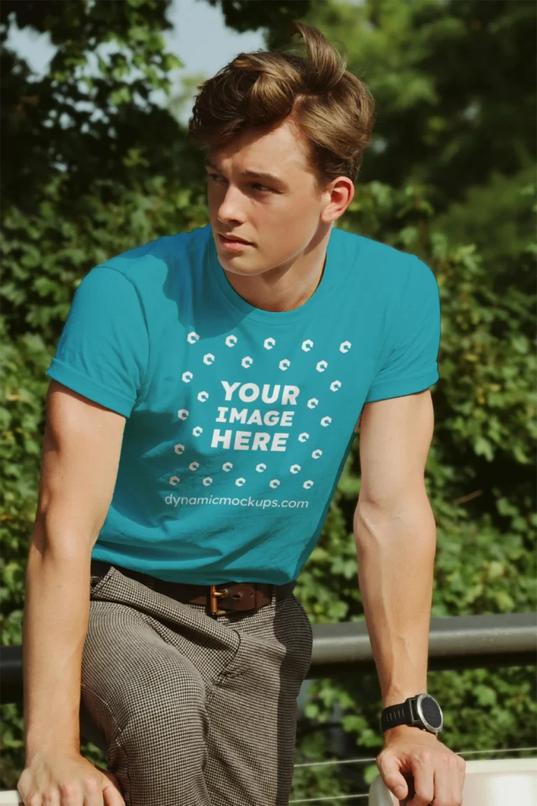 Man Wearing Teal T-shirt Mockup Front View Template