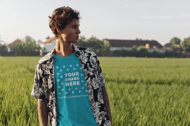 Man Wearing Teal T-shirt Mockup Front View Template