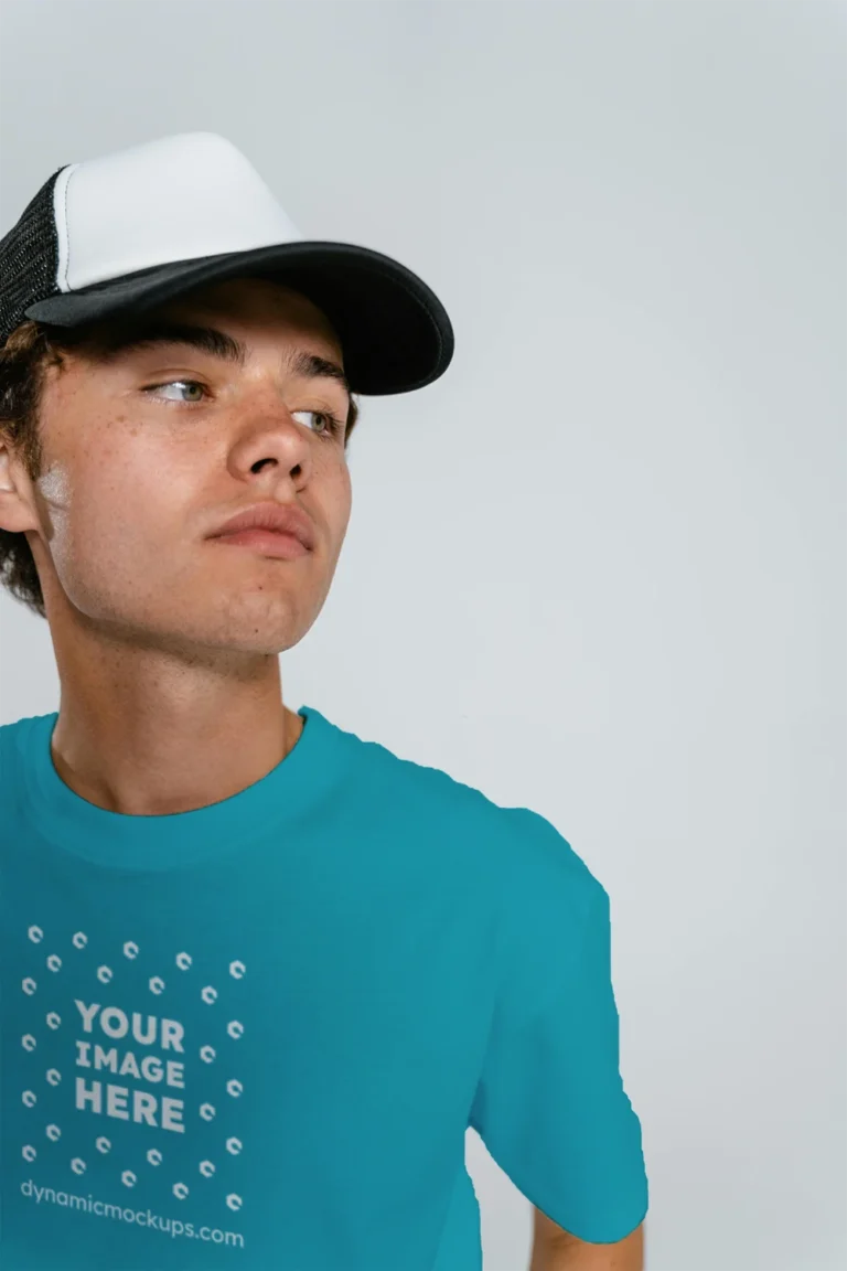 Man Wearing Teal T-shirt Mockup Front View Template