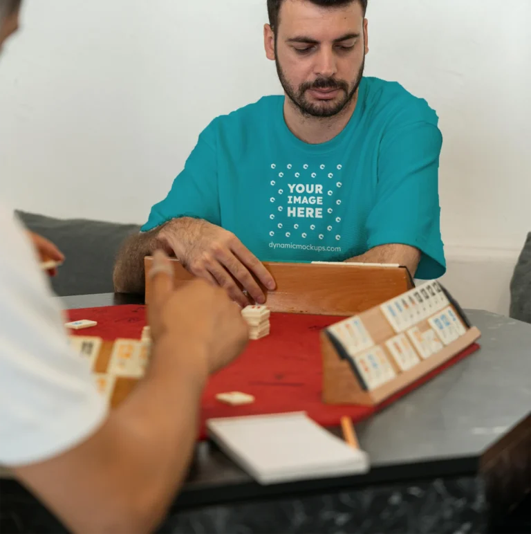 Man Wearing Teal T-shirt Mockup Front View Template