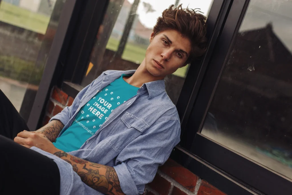 Man Wearing Teal T-shirt Mockup Front View Template
