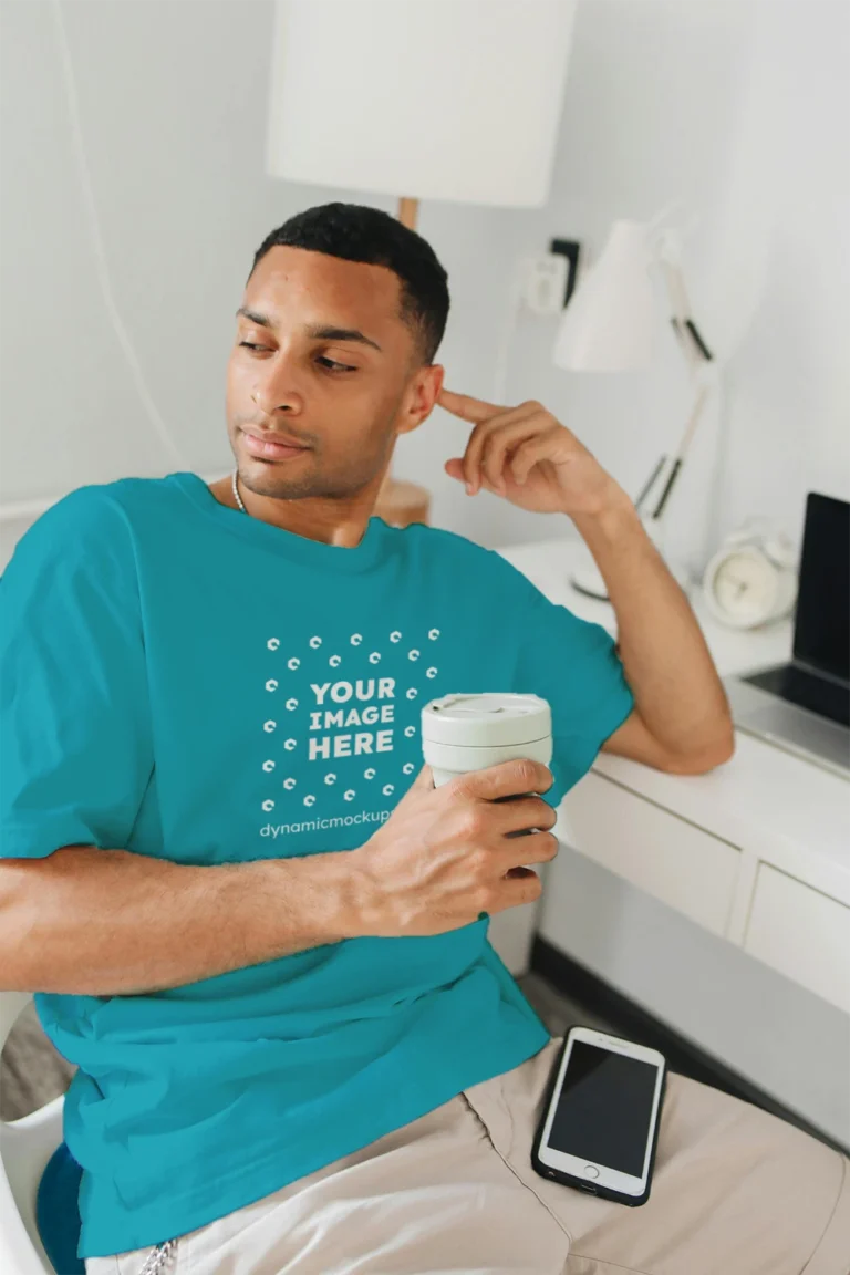 Man Wearing Teal T-shirt Mockup Front View Template