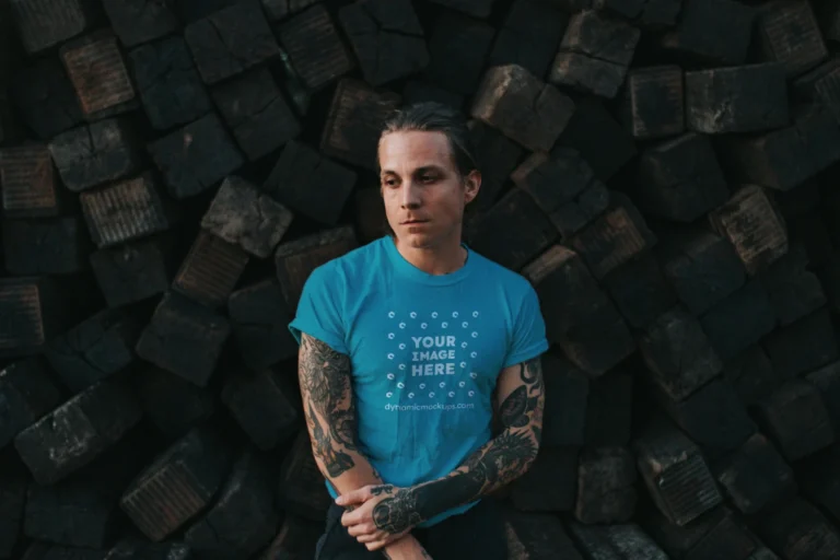 Man Wearing Teal T-shirt Mockup Front View Template