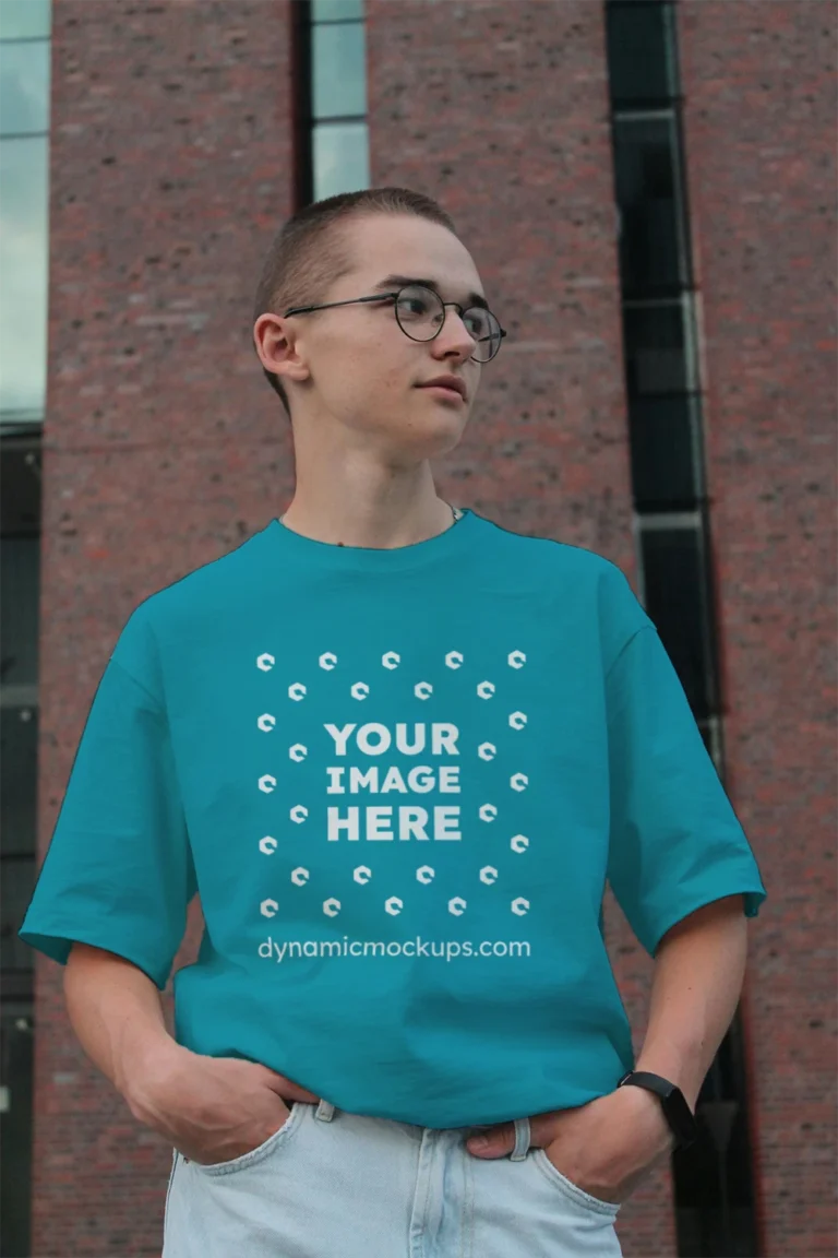 Man Wearing Teal T-shirt Mockup Front View Template