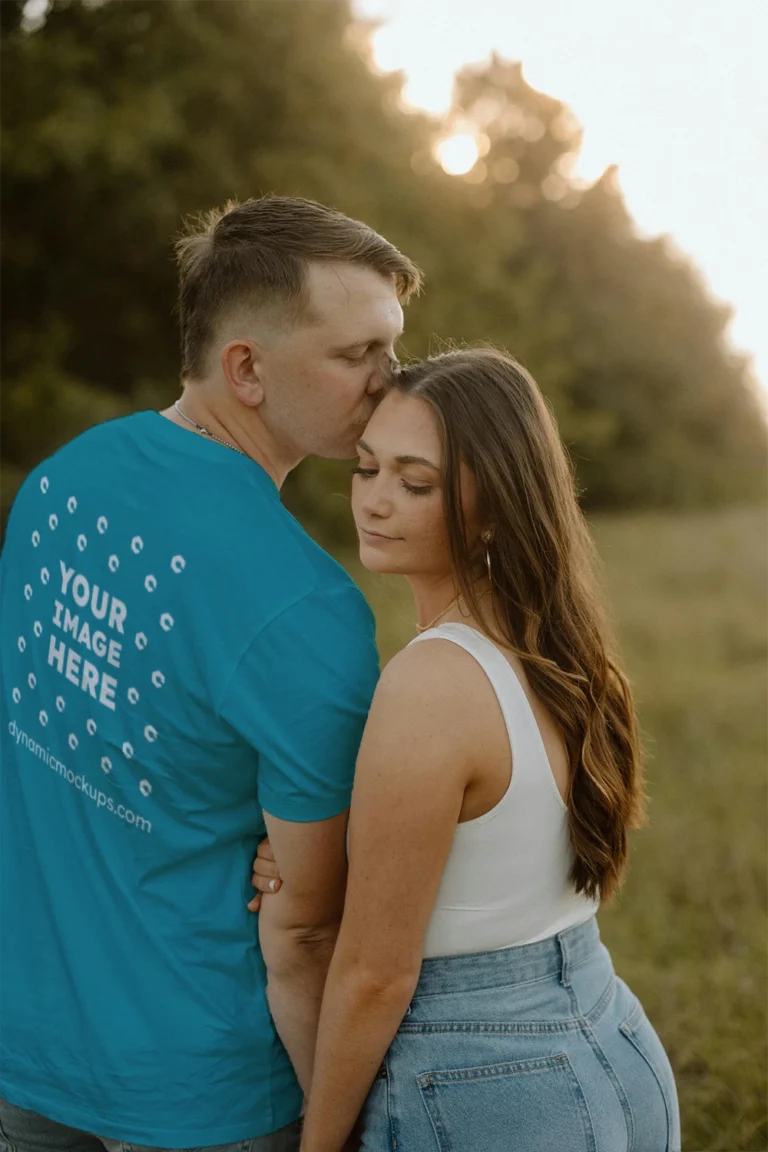 Man Wearing Teal T-shirt Mockup Back View Template