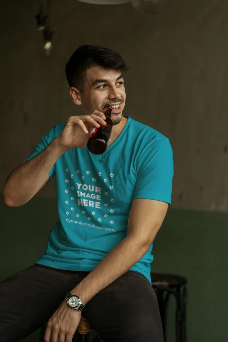 Man Wearing Teal T-shirt Mockup Front View Template