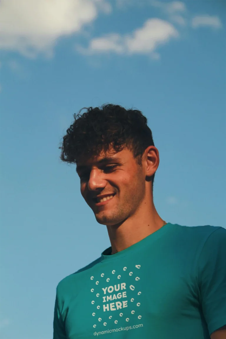 Man Wearing Teal T-shirt Mockup Front View Template