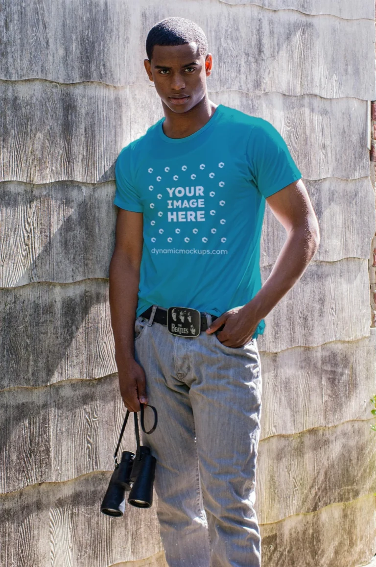 Man Wearing Teal T-shirt Mockup Front View Template