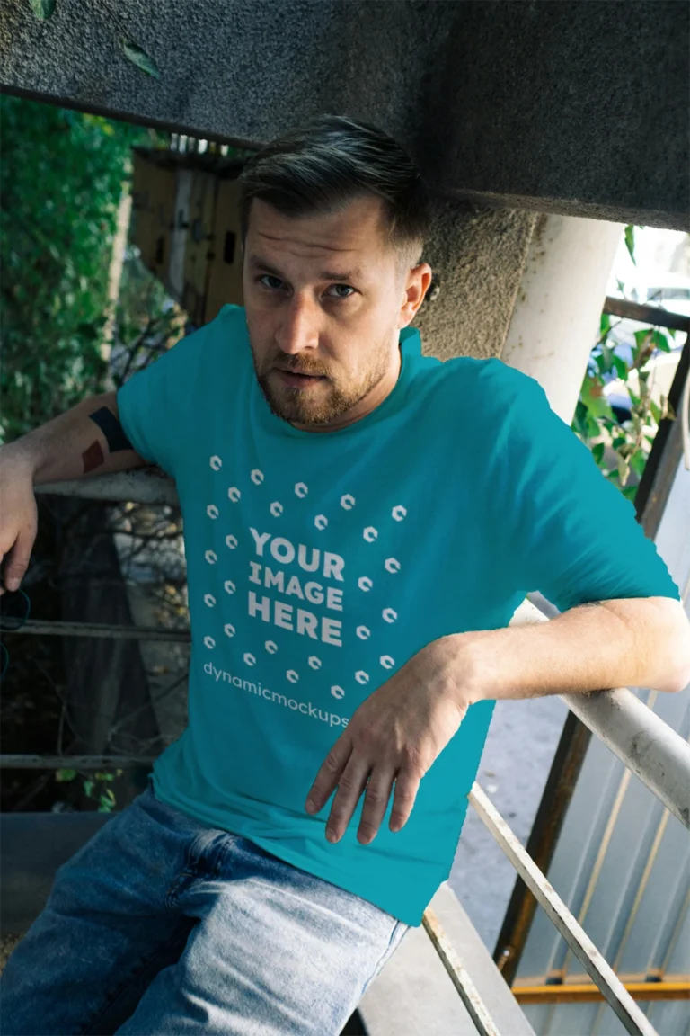 Man Wearing Teal T-shirt Mockup Front View Template