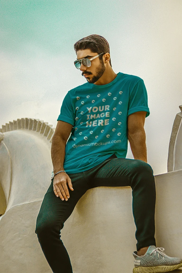 Man Wearing Teal T-shirt Mockup Front View Template
