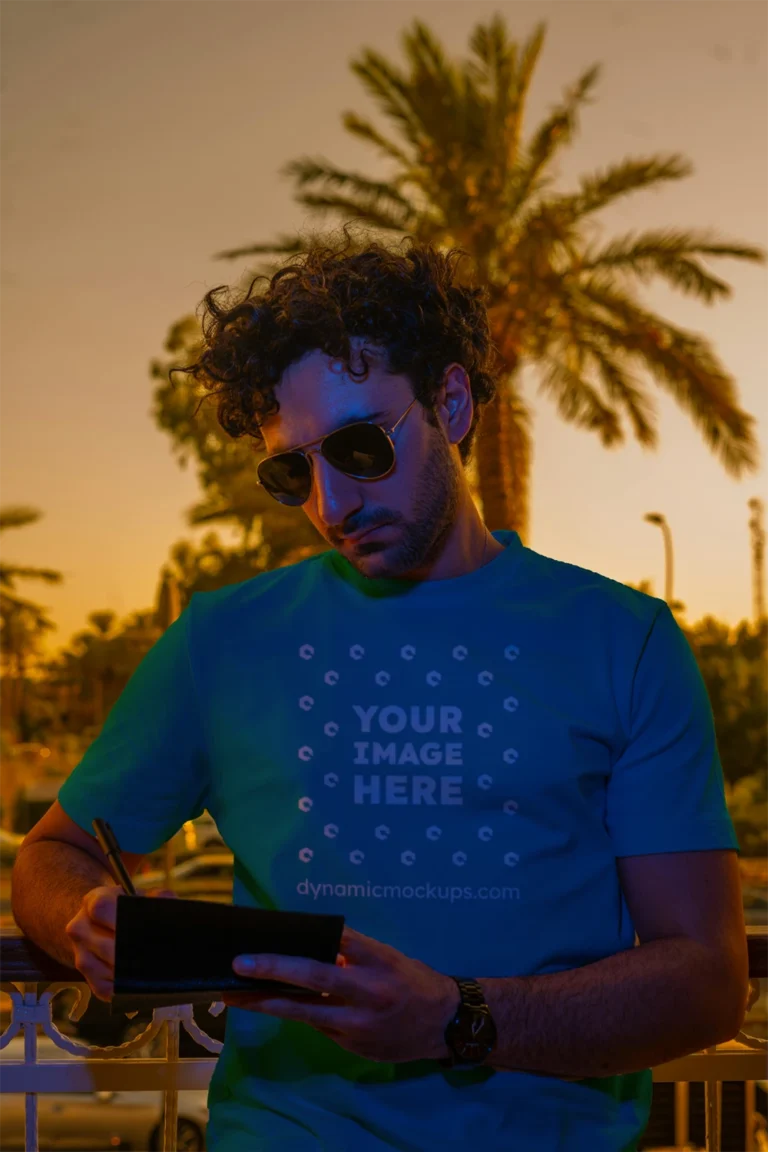Man Wearing Teal T-shirt Mockup Front View Template