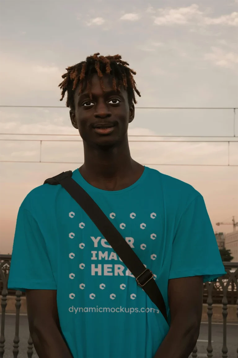 Man Wearing Teal T-shirt Mockup Front View Template
