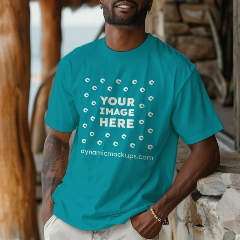 Man Wearing Teal T-shirt Mockup Front View Template