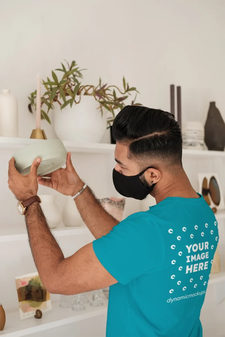 Man Wearing Teal T-shirt Mockup Back View Template