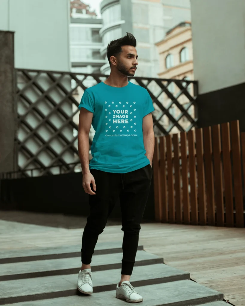 Man Wearing Teal T-shirt Mockup Front View Template