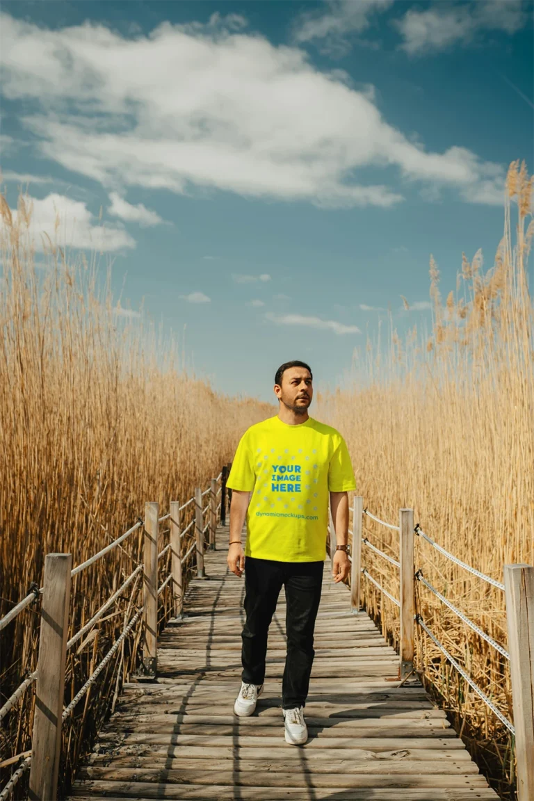 Man Wearing Yellow T-shirt Mockup Front View Template