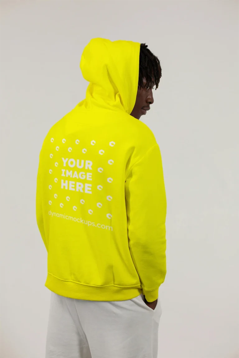 Man Wearing Yellow Hoodie Mockup Back View Template