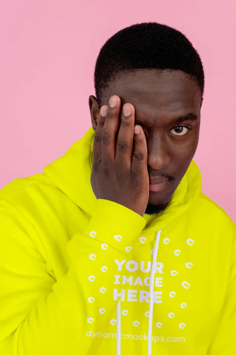 Man Wearing Yellow Hoodie Mockup Front View Template