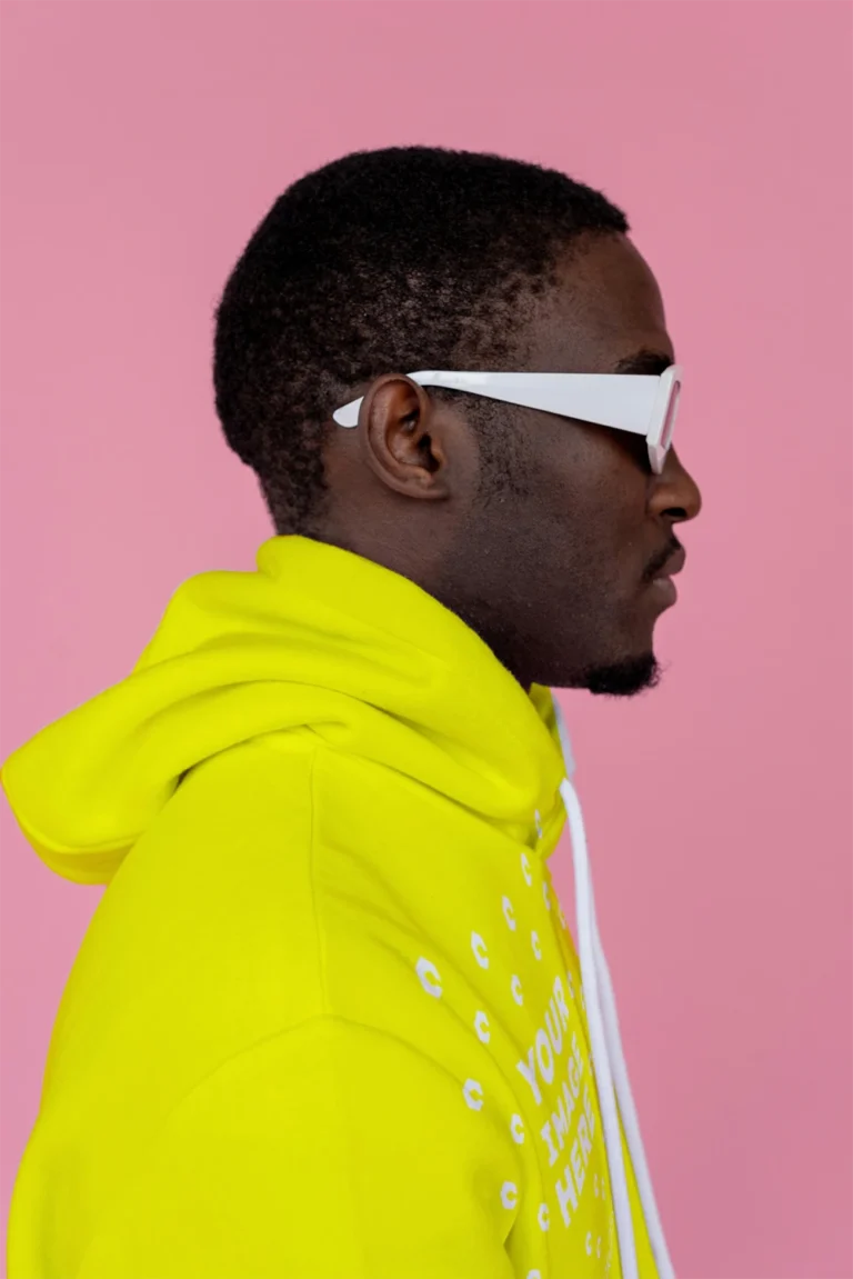 Man Wearing Yellow Hoodie Mockup Side View Template