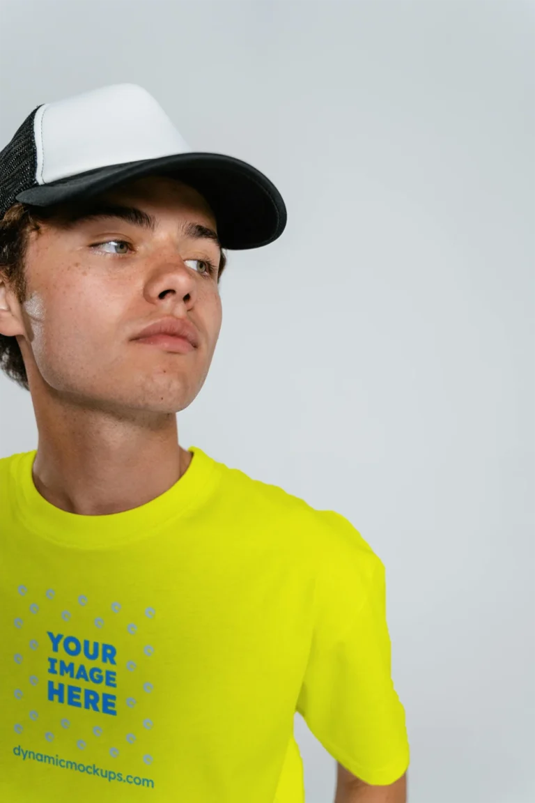 Man Wearing Yellow T-shirt Mockup Front View Template