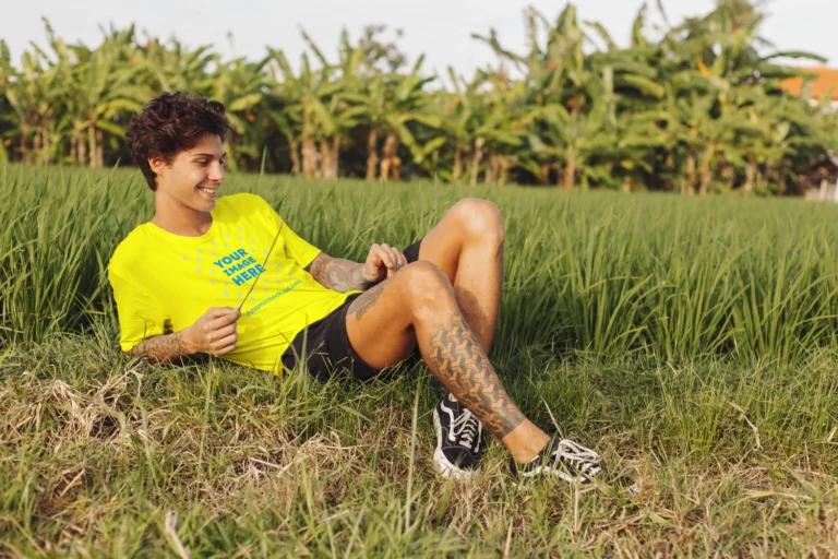 Man Wearing Yellow T-shirt Mockup Front View Template