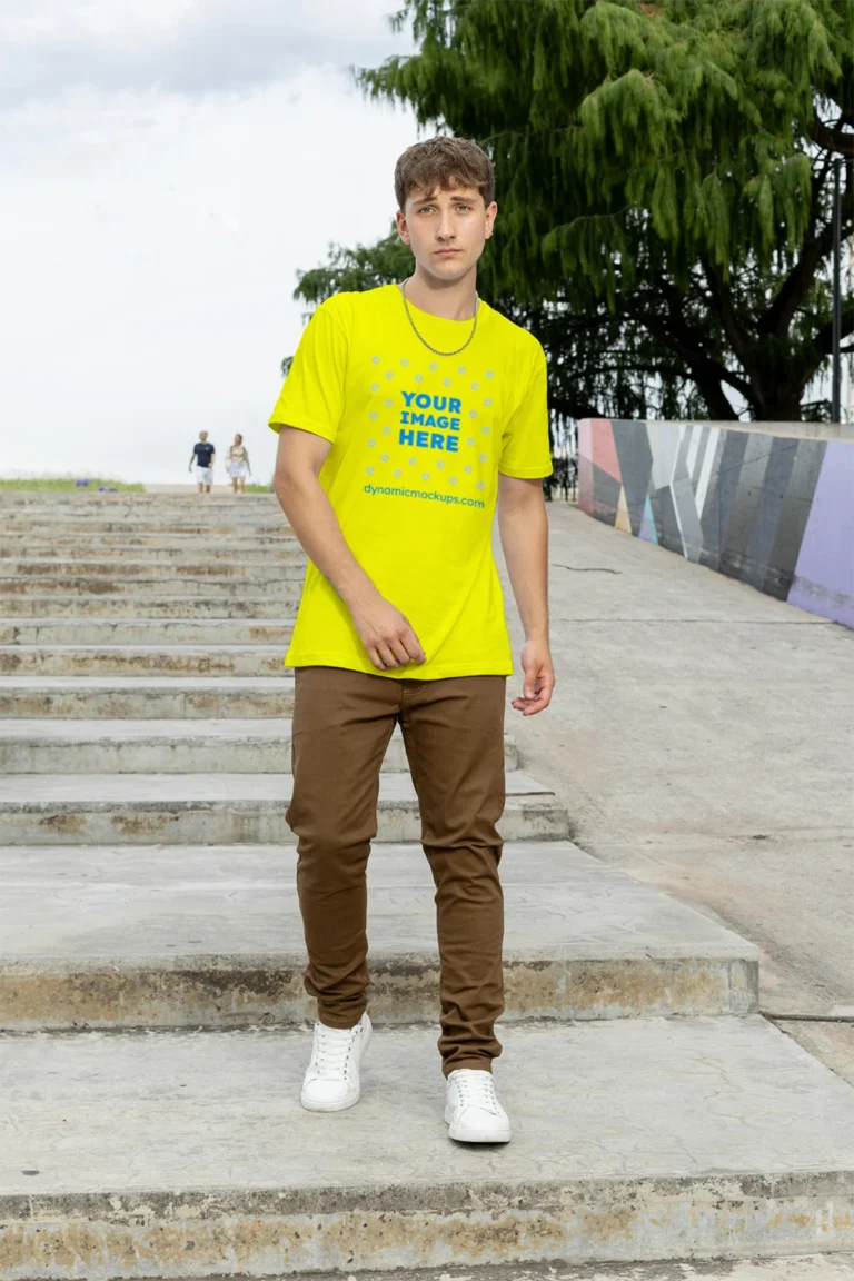 Man Wearing Yellow T-shirt Mockup Front View Template