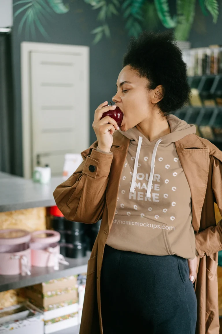 Woman Wearing Beige Hoodie Mockup Front View Template