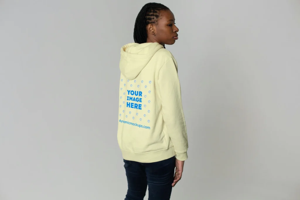 Woman Wearing Cream Hoodie Mockup Back View Template
