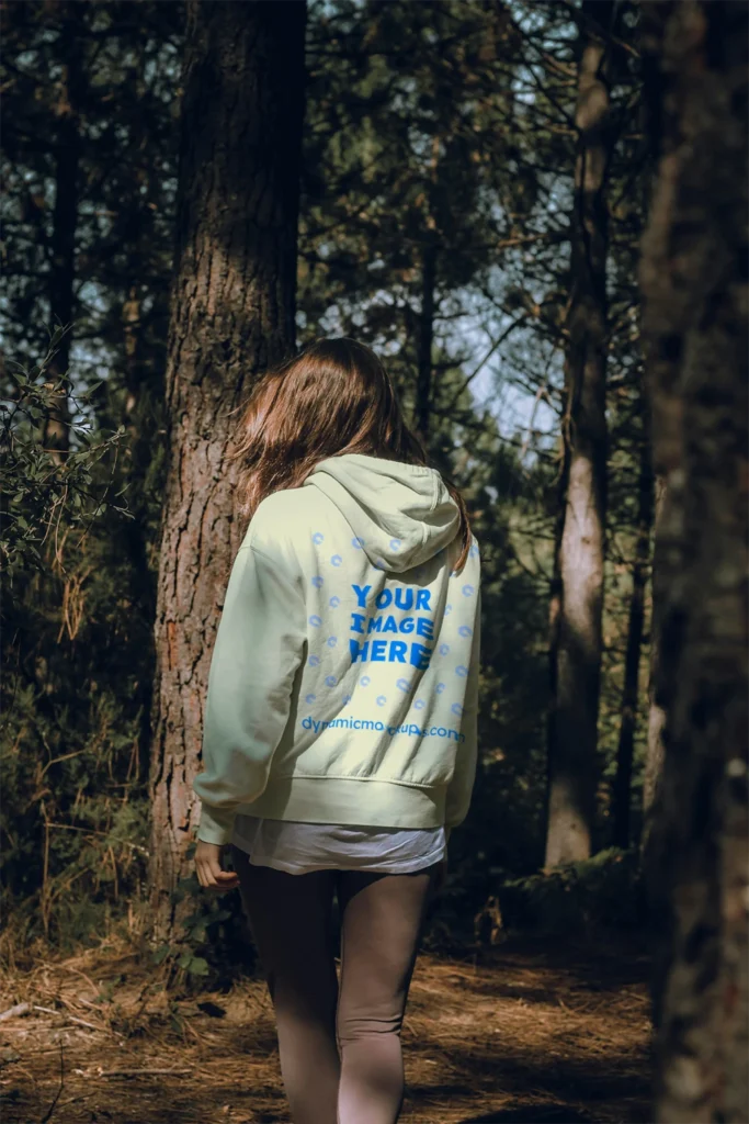 Woman Wearing Cream Hoodie Mockup Back View Template