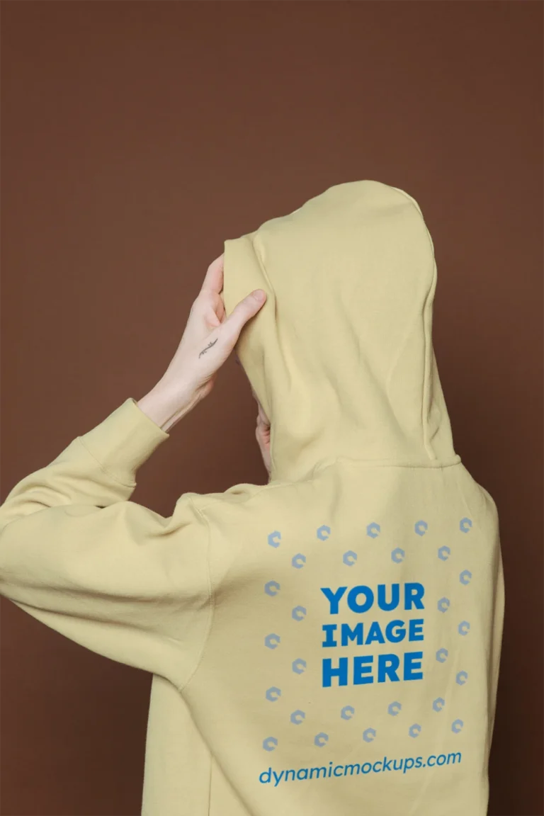 Woman Wearing Cream Hoodie Mockup Back View Template