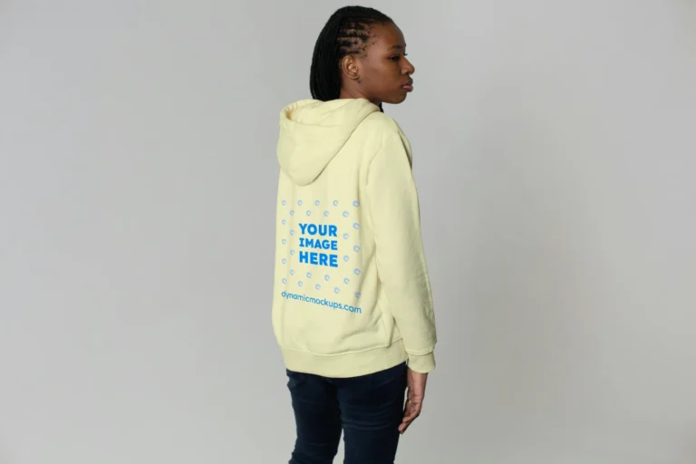 Woman Wearing Cream Hoodie Mockup Back View Template