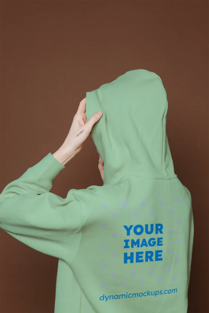 Woman Wearing Mint Hoodie Mockup Back View Template