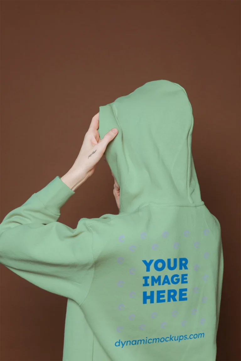 Woman Wearing Mint Hoodie Mockup Back View Template